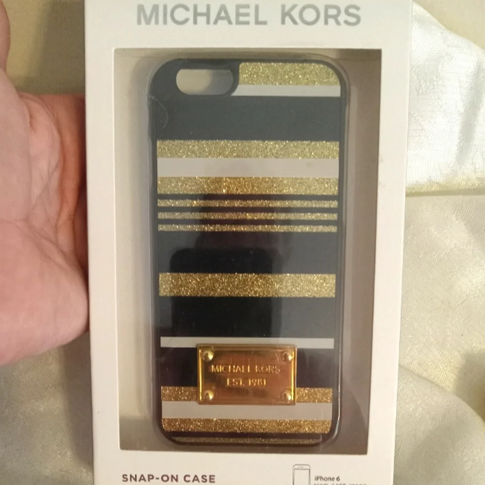 Michael Kors gold glitter white black Apple I phone 6 case.